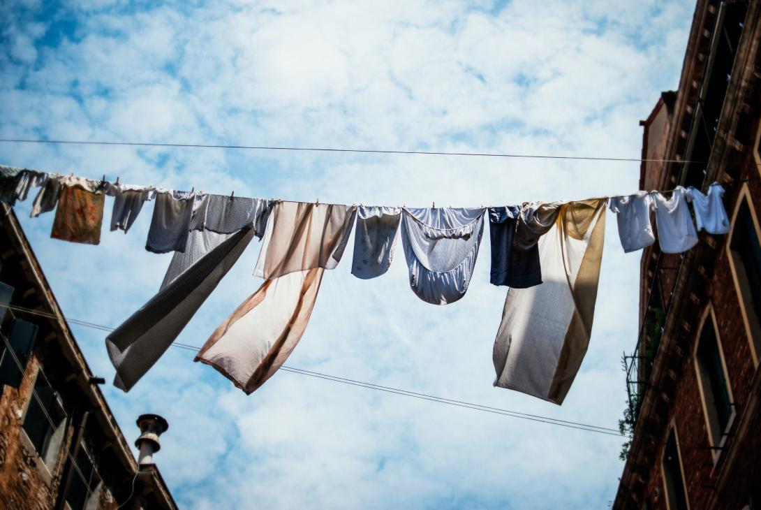 A picture of a washing line on a breezy summer day.